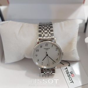 Tissot watch new, with labels and in original box